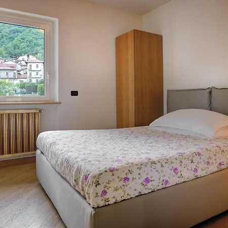 Perched Above The Gleaming Waters Of Lake Como With Modern Comforts