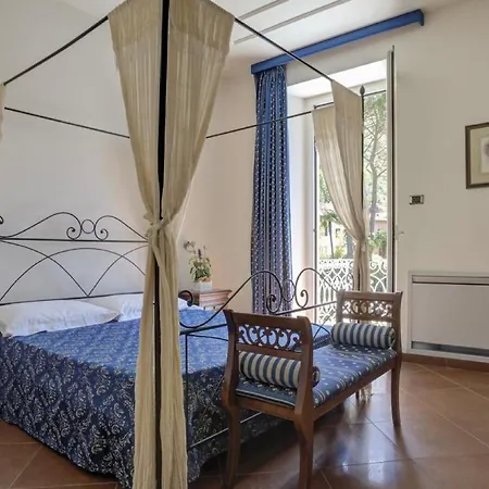 Perched Above The Gleaming Waters Of Lake Como With Modern Comforts