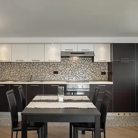 Perched Above The Gleaming Waters Of Lake Como With Modern Comforts